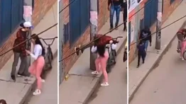 Mujer sorprende a los internautas por cargar a su novio borracho (+Video)