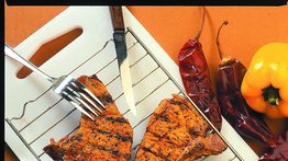 Chuletas de cerdo al calor de las brasas