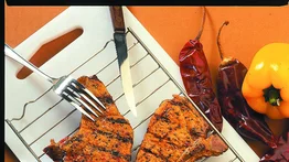 Chuletas de cerdo al calor de las brasas