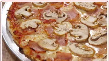 Pizza con champiñones y jamón