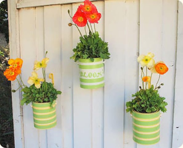 Convierte las latas en originales macetas para el jardín Convierte las latas en originales macetas para el jardín