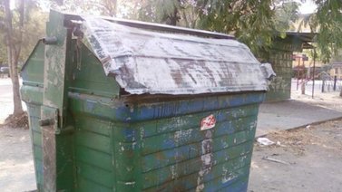 Cadáver de una mujer es localizado dentro de contenedor de basura