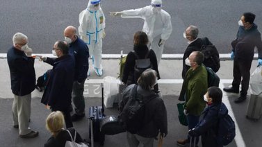 Expertos de la OMS llegan a Wuhan para investigar el virus