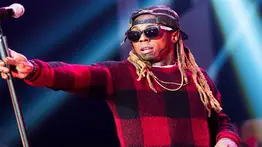 Lil Wayne es acusado por posesión de arma en Florida