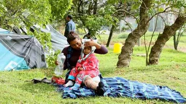 A la sombra de su sueño, venezolanos acampan en Bogotá y esperan un futuro