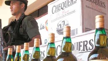 Acusan a cinco hombres por asalto a gandola con 13mil botellas de whisky