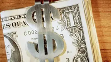 El origen del símbolo del dólar es… El origen del símbolo del dólar es…