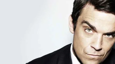 Robbie Williams declara ser "medianamente homosexual"