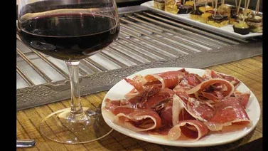 Vino tinto y jamón ibérico para adelgazar