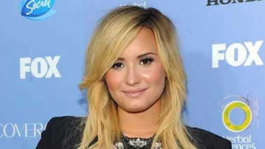 Demi Lovato escribirá en inglés y español