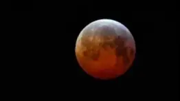 Eclipse lunar parcial, karmática 